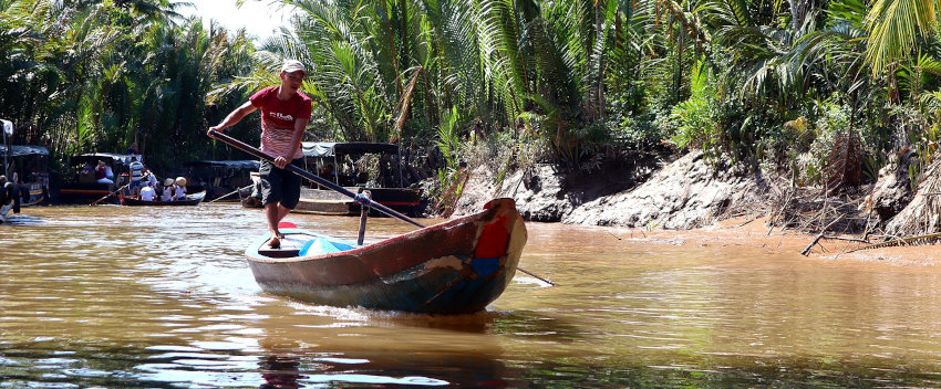 delivery of materials by boat in mekong delta