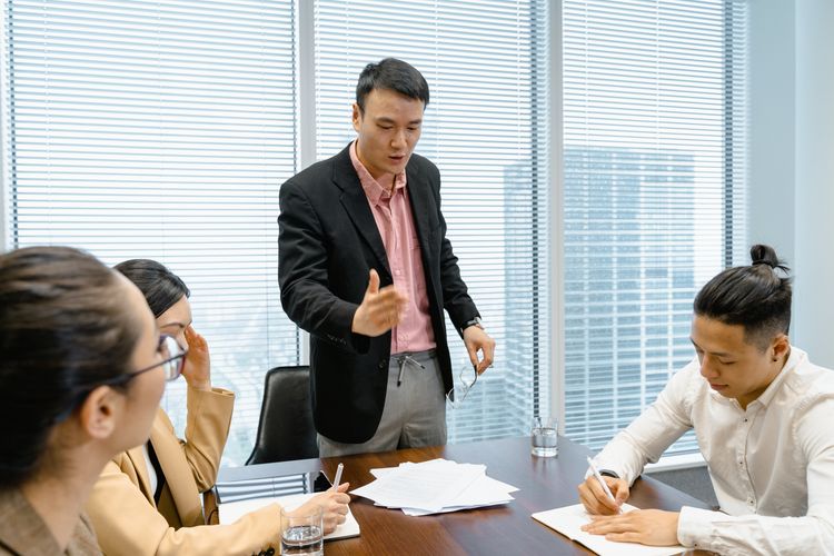 Business meeting between colleagues in Cambodia.