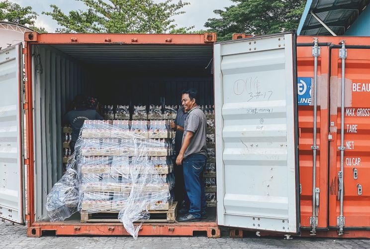 Shipping container loaded with goods in Malaysia.